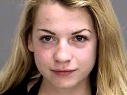 Woman rams squad car while taking topless selfie, police say