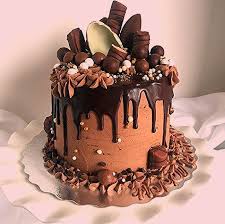 Mettez En Scene Votre Gateau Un Dripping Cake 100 Chocolat Surmonte De Gourmandises Plus D Idee Ultimate Chocolate Cake Birthday Cake Chocolate Drip Cakes