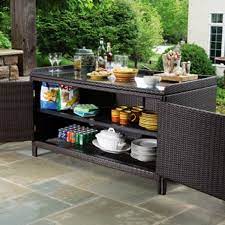 An outdoor entertainer's dream, this contemporary and stylish buffet table provides plenty of storage, prep and serving space for your next gathering. Outdoor Buffet Table Decor Novocom Top