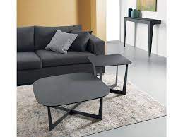 A shelf for newspapers metal enough organically combined as a cold stone, and with a rough veneer. Metal Coffee Table Stone