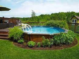 Check spelling or type a new query. 17 Ways To Pretty Up An Above Ground Pool Above Ground Pool Landscaping Best Above Ground Pool Pool Landscaping