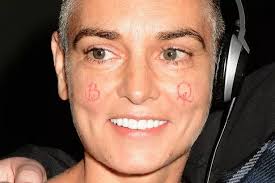 Sinead O'Connor shows off new B&Q cheek tattoos, Cheryl Cole bum cheeks:  The celebrities inked with regrettable artwork