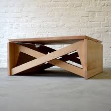This transforming coffee table has an extending desktop which lifts up without any effort to create cozier place and easy way to use.free you from leaning forward so hard to use laptop or other devices so that you can relax on your couch. Mk1 Transforming Coffee Table Configuring Comfort Furniture Small Spaces