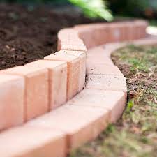 Suncast bbe10tc interlocking no dig border edging, 12 inch section, brick design & resin construction for garden, lawn, & landscape edging, 20 pack 4.2 out of 5 stars 106 $55.99 $ 55. How To Plant A Curved Brick Flowerbed Border Brick Garden Edging Brick Garden Garden Edging