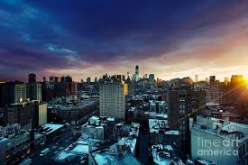 Watch night fall on the city as the sun sets behind the statue of liberty from the unbeatable vantage point of the harbor. Winter Sunset West Village And Lower Manhattan New York Photograph By Eldad Carin