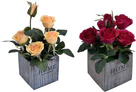 The fake flowers are actually real, at least in a sense. Buy Yatai 2 Pack Artificial Rose Flowers Potted Artificial Plants In Wooden Pot Fake Flowers Small Roses Houseplants Yellow Red Online Shop Home Garden On Carrefour Uae