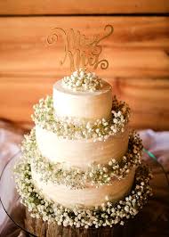 Wedding Cake With Babys Breath Light Blue Tan Summer Wedding At The The Variety Works Photographe In 2020 Wedding Cake Table Cool Wedding Cakes Summer Wedding Cakes