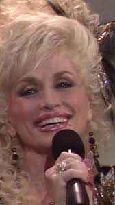 I'm always in costume at Christmas. If I'm not in a Santa suit, I wear reds  and greens. I wear sweaters with Christmas lights