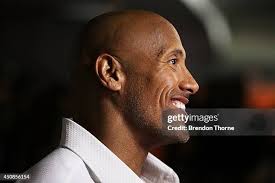 Beau Flynn, Dwayne Johnson and Hiram Garcia arrives at the screening...  News Photo