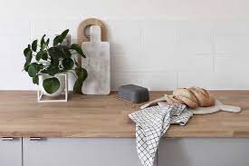 This makes it very easy to match with granite or stone kitchen worktops and high gloss cabinets in a variety of colours. A Guide To Wooden Kitchen Worktops These Four Walls