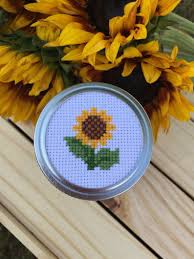Cross stitching cross stitch embroidery embroidery patterns cross stitch patterns mason jar lids jar crafts bees needlework projects to try. Sunflower Mason Jar Mason Jar Decor Cross Stitch Mason Jar Etsy Mason Jar Decorations Cross Stitch Sunflower Decorated Jars