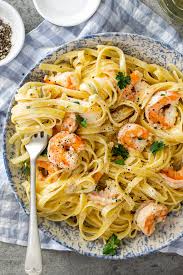 The perfect appetizer or quick dinner idea that's ready in 20m! Creamy Lemon Garlic Shrimp Pasta Simply Delicious