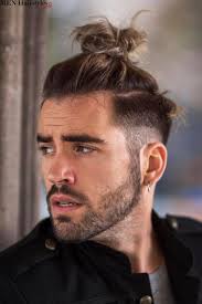 Cool Top Knot Styles For Men You Ve Seen It Everywhere From New School Rappers To Teenage Guys Hip In 2020 Man Bun Hairstyles Man Bun Haircut Long Hair Styles Men