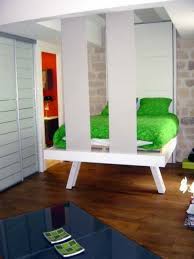 bed descends from the ceiling space saving furniture modern dining room set contemporary bedroom