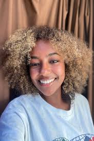 This means that if someone with curly hair and someone with straight hair have a child, this child would have wavy hair. 6 Vogue Staffers Reflect On Their Changing Relationship With Their Natural Hair British Vogue