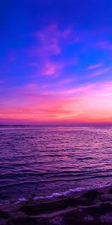 Shop our purple wallpaper today! Purple Sunset Beach Sunset Wallpaper Sunset Wallpaper Beautiful Landscape Wallpaper