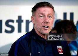Wes Atkinson of Notts County grabs Lewis Hawkins of Hartlepool neck... News  Photo
