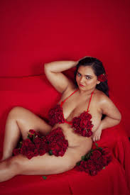 Sultry Desi MILF Srishti Banerjee hides her big boobs in a rose flower  bikini and nude