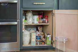 I bought one of these and organized the bottom of the cabinet. Easy Kitchen Organizing Bigger Than The Three Of Us