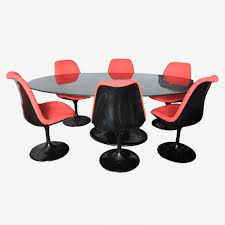 These kitchen chairs have a linen fabric seat, button tufted chair back, and the wood dining table is consists of a rectangular top and wooden 4 legs. Black Tulip Dining Table Set Of 6 Red Upholstered Dining Chairs 1980s 143921