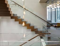 Vista railings provides premium aluminum railing and glass railing solutions that meet or exceed the quality standards and safety demands of today's family home situations. Floating Spiral Staircase With Glass Railing Increases Natural Light Sc Railing Company Glassonweb Com