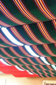 Mix And Match Colorful Fabrics To Create Your Retractable Awning On Slide Wire Fabric Canopy Fabric Awning Patio Shade