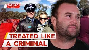 Justin Poore is a former footy player who's now been kicked out of the  force because he didn't want a COVID vaccine. , More than two years later,  the rules have changed but Poore still can't serve., ...
