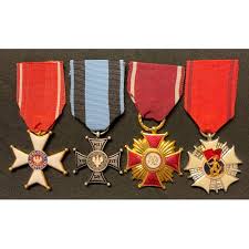 Polish state order for extraordinary and distinguished service. Order Of Polonia Restituta 1944 Complete With Ribbon Along With A Cross Of Merit 1st Class Without S