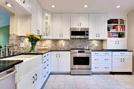 This lovely kitchen pairs granite backsplash with black black granite kitchen countertops will pair extraordinary well with a classic or modern white kitchen design. 10 Most Adorable White Kitchen Cabinets With Black Countertops To Create Elegant Modern Style Aprylann