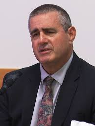 Ex-basketball coach Aaron Thomas takes stand in 'naked fat testing' trial