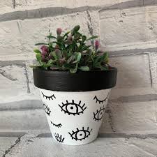 Black And White Flower Pot Images Hand Painted Black And White Eyes Evil Eye Painted Plant Pot In 2020 Painted Plant Pots Flower Pot Art White Flower Pot