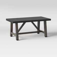 Once the weather warms up, backyards are the focal point for family dinners or friendly gatherings. Faux Wood Patio Coffee Table With Faux Concrete Tabletop Smith Hawken Target