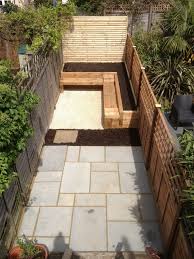 Update a small garden with our small garden ideas, featuring garden design tips, planting advice for gardens and patios for small garden designs. Small Garden Ideas With Sleepers Image13 Garden Design Small Garden Design Small Backyard Landscaping Small Courtyard Gardens