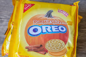 Chocolate sandwich cookies shaped using halloween cookie cutters. Halloween Pumpkin Oreos With Candy Eyeballs Lil Luna