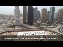 But (laughter) obviously, 33,600 is kind of an exception. Dmcc Breaks Guinness World Record For Largest Jigsaw Puzzle Year Of Zayed 2018 Youtube