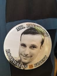 Officer Michael Manuel was sworn in as a member of the Rockwall Police  Department. His family went above and beyond in showing their support for  him, by wearing buttons of his Class