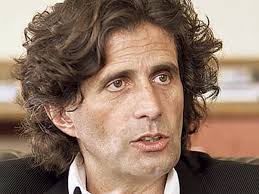 Embattled head of UH Cancer Center resigns