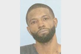 Little Rock man who reported bodies arrested, charged with 2 murder counts 