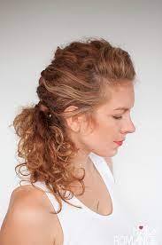 Braids hairstyle 2021 features wavy hair with two side braid ponytail hairstyles that meet in the middle. Easy Everyday Curly Hairstyle Tutorials The Curly Side Braid