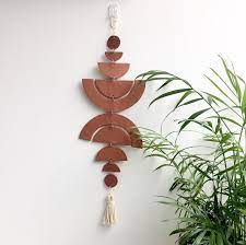Amy guerrero is an arts and crafts specialist and the owner of sunshine craft co., a crafting studio based in phoenix, arizona. Calypso Boho Clay Wall Hanging Terracotta Wall Hanging Terracotta Wall Decor Boho Decor Clay Hanging Wall Decor Wall Decor Boho In 2021 Clay Wall Hanging Clay Wall Hanging Wall Decor
