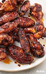These Chicken Wings Have A Spicy Addicting Marinade Recipe Chicken Wing Recipes Spicy Asian Chicken Wing Recipes