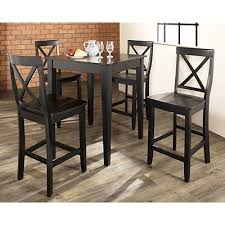 This 5 piece pub dining room set is a perfect homeessential, make use of an empty corner or sitting area in your home andutilize this table and chairs set as a casual seating solution orutilize it as an affordable centerpiece for having meals with family inyour kitchen. Crosley 5 Piece Pub Dining Set With Tapered Leg And X Back Stools In Black Finish Kd520005bk Buy Online In Angola At Angola Desertcart Com Productid 150683521