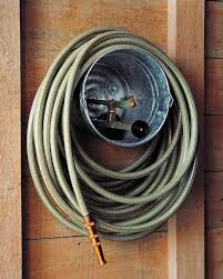 Idee De Rangement D Outils De Jardin Pour Mur De Garage Hose Storage Shed Organization Martha Stewart Home