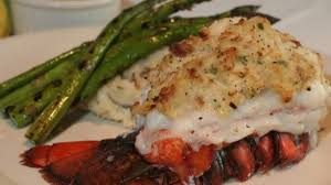 Split top side of lobster shell down center with scissors, keeping tail fan intact. Christmas Eve Maine Stuffed Lobster Tail Recipe