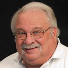 What steps should be taken to prepare raised beds for spring gardening in  Cobb County, GA?