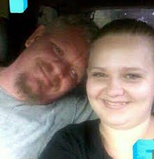 Is the black dog at Spark Station a stray or does it have an owner?