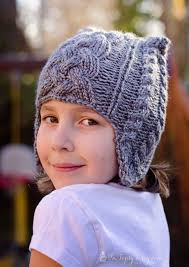 You can access the free pattern for these gorgeous knitted hats with ear flaps from purl soho. Cable Knit Beanie Pattern With Earflaps Child Ashlee Marie Real Fun With Real Food