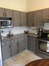 After Painted Grey Kitchen Cabinets With Benjamin Moore Metropolis White Subway Tile Col Kitchen Cabinets Painted Grey Kitchen Design Grey Kitchen Cabinets