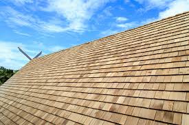 Shingles have a smooth uniform look that spans the entire roof surface. Cedar Shingles Wood Shake Roofs Costs 2019 Modernize