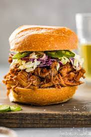 Straight On Shot Of Easy Carolina Bbq Pulled Pork Sandwich On A Brioche Bun With Jalapeno Colesl Bbq Pulled Pork Bbq Pulled Pork Sandwiches Pulled Pork Recipes
